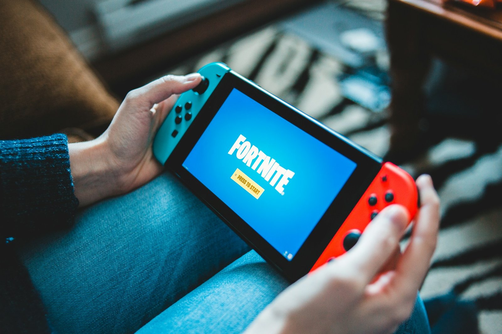 a black and red nintendo switch gaming console